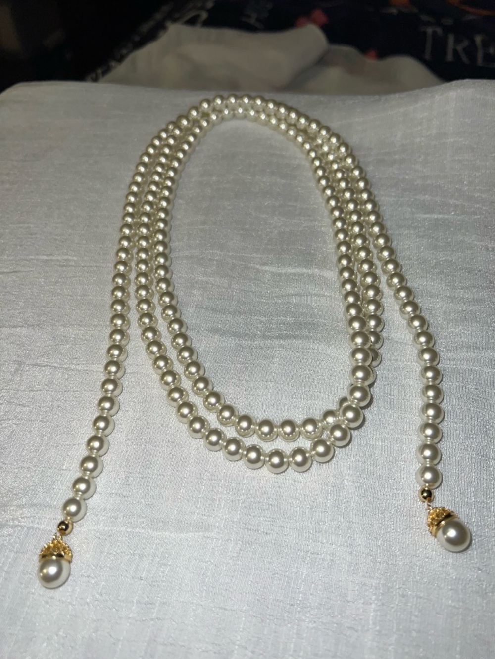 Lustrous Cream Pearl Rope Necklace with Gold Accents